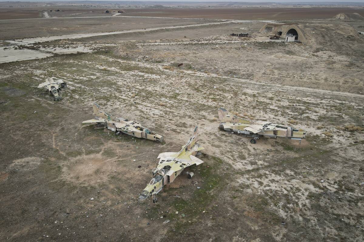 Decommissioned Syrian Air Force planes are seen at the Abu al-Duhur military airport, east of I ...