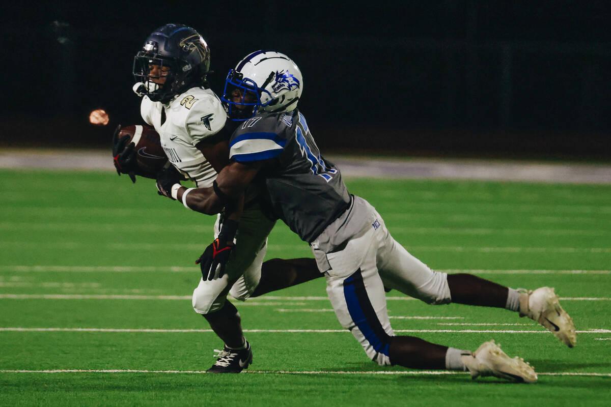 Basic linebacker Silvian David, right, is a member of the Nevada Preps All-Southern Nevada foot ...