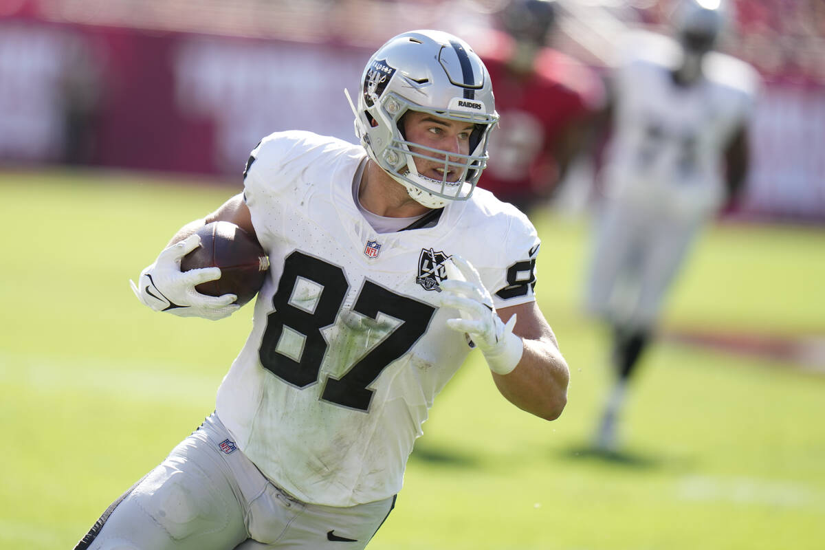 Las Vegas Raiders tight end Michael Mayer (87) runs after a catch against the Tampa Bay Buccane ...