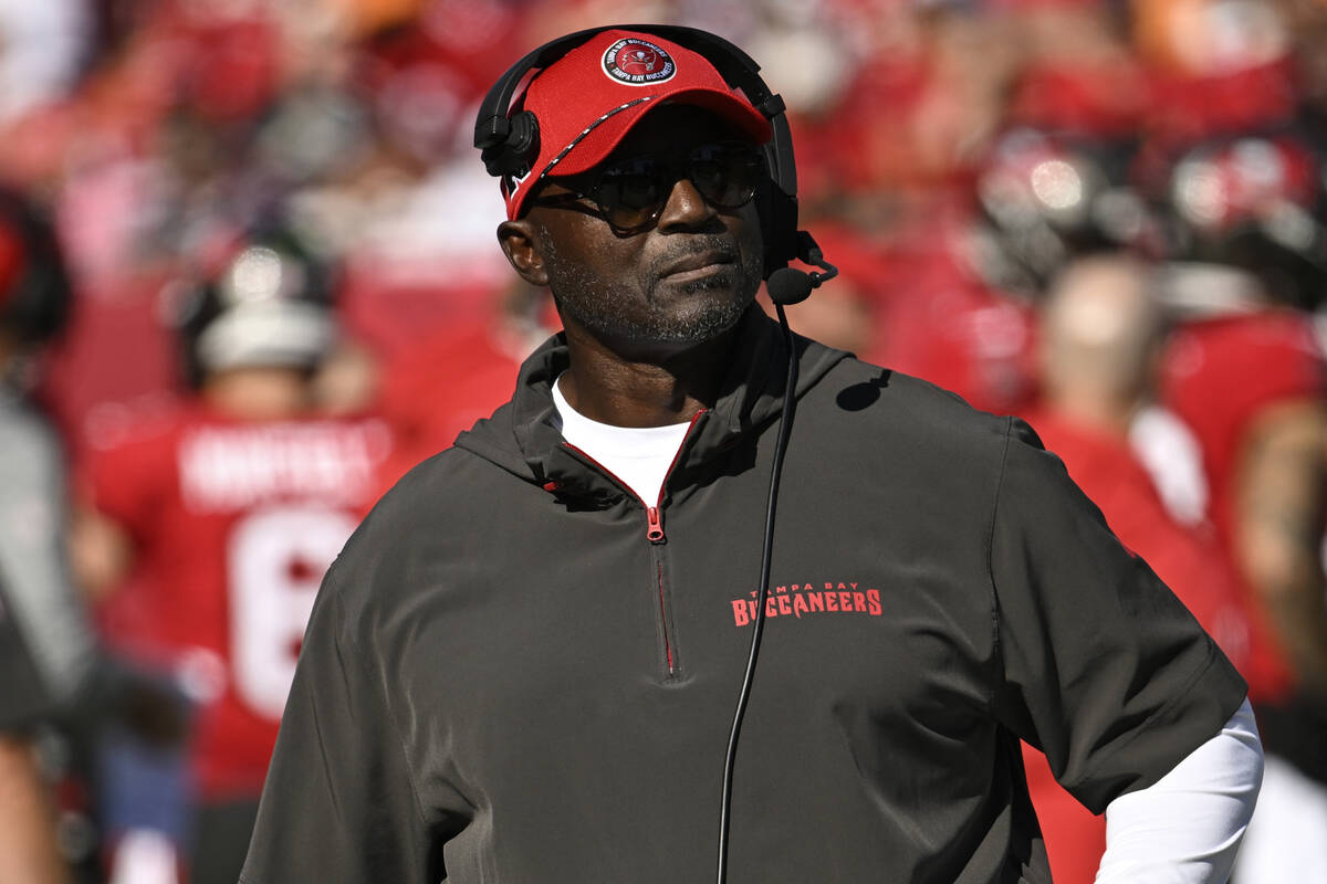 Tampa Bay Buccaneers head coach Todd Bowles walks on the sidelines during the first half of an ...