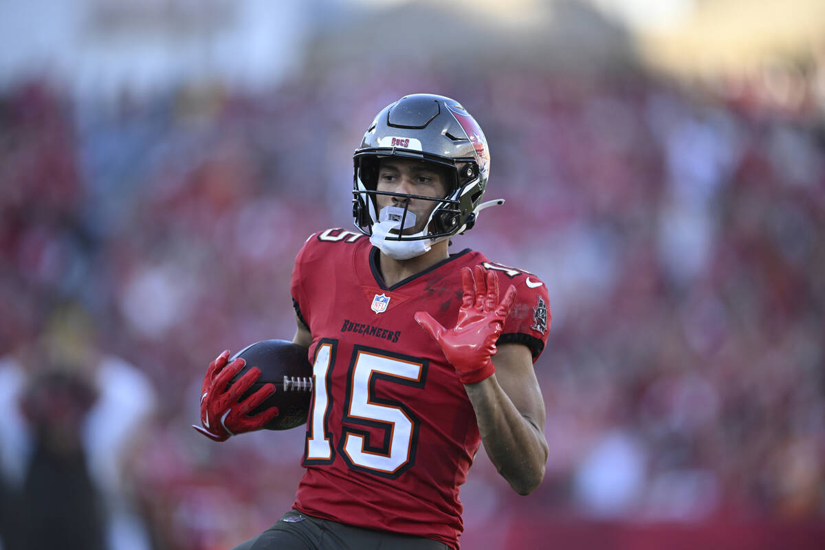 Tampa Bay Buccaneers wide receiver Jalen McMillan (15) scores a touchdown on a 29-yard pass pla ...