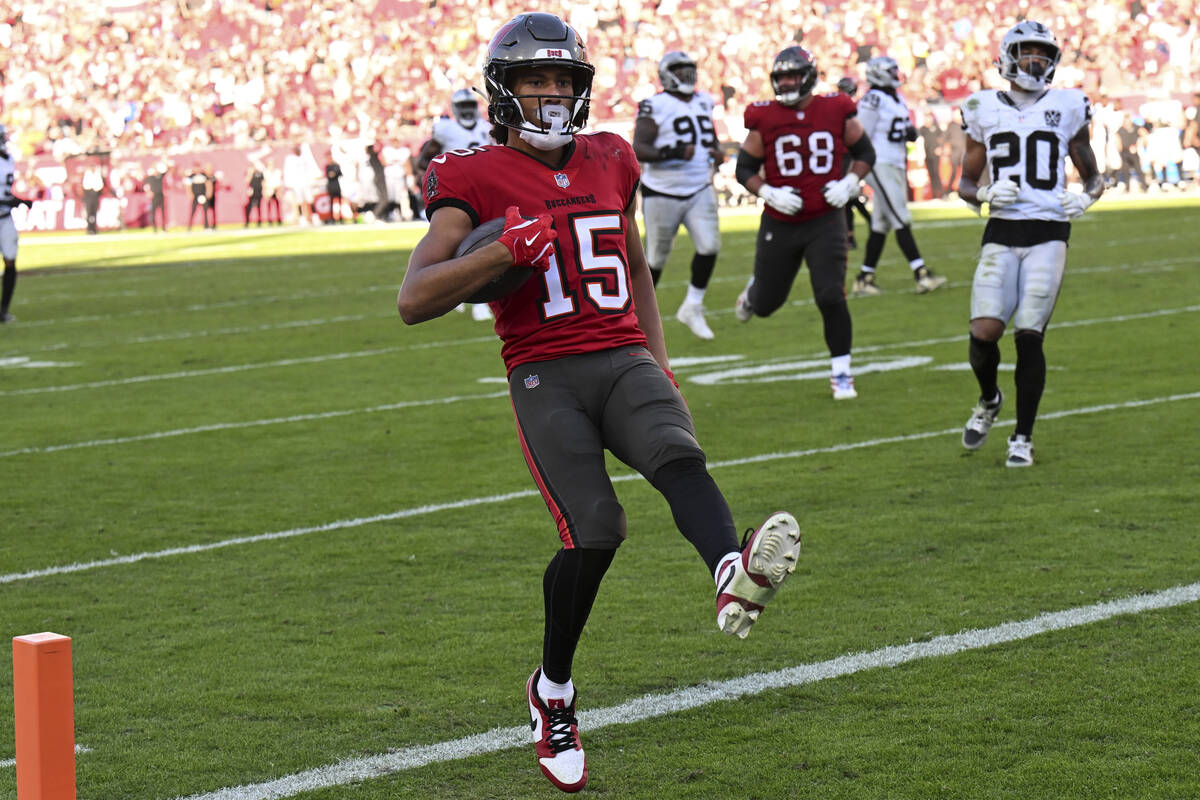 Tampa Bay Buccaneers wide receiver Jalen McMillan (15) runs into the end zone for a touchdown a ...