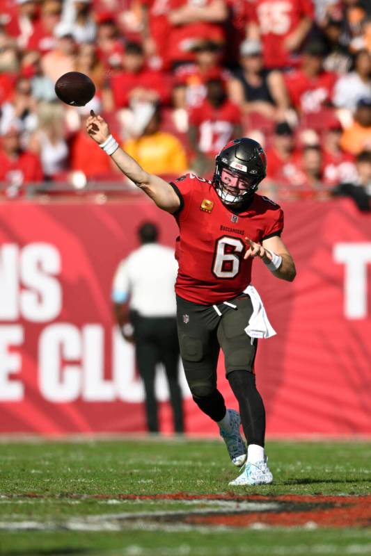 Tampa Bay Buccaneers quarterback Baker Mayfield (6) throws a pass against the Las Vegas Raiders ...