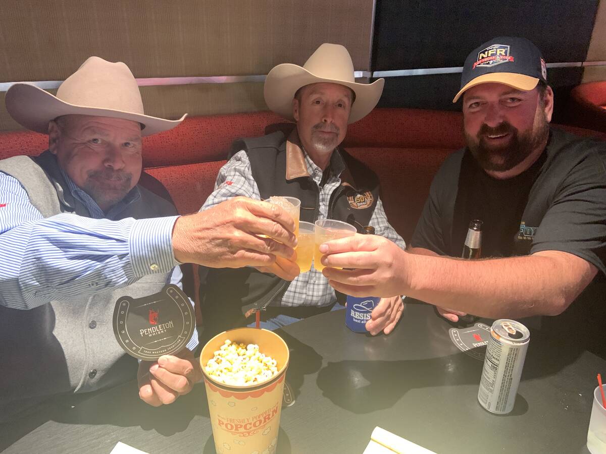 From left, Phil Brown, Scot Corbin and Grant Pasley share a toast of Pendleton Whisky during Fr ...