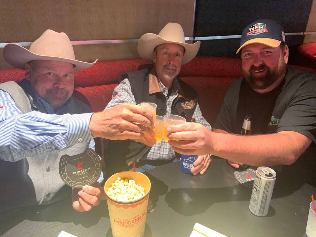 From left, Phil Brown, Scot Corbin and Grant Pasley share a toast of Pendleton Whisky during Fr ...