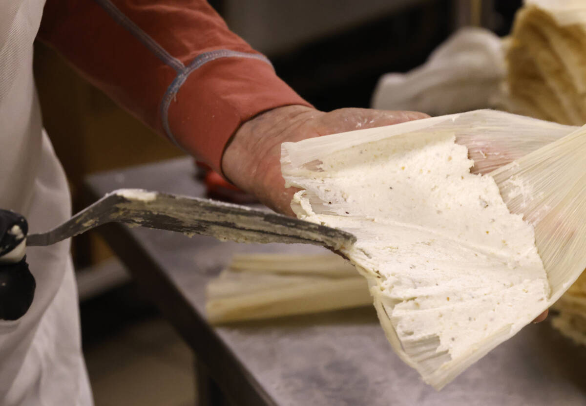 Neriza Martinez Johnson, owner of Doña Maria's Tamales, makes tamales at her restaurant on Thu ...