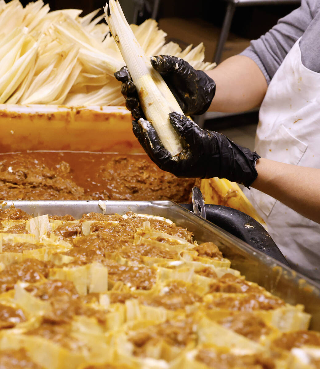 Jesus Castillo makes tamales at Doña Maria's Tamales, on Thursday, Dec. 12, 2024, in Las Vegas ...