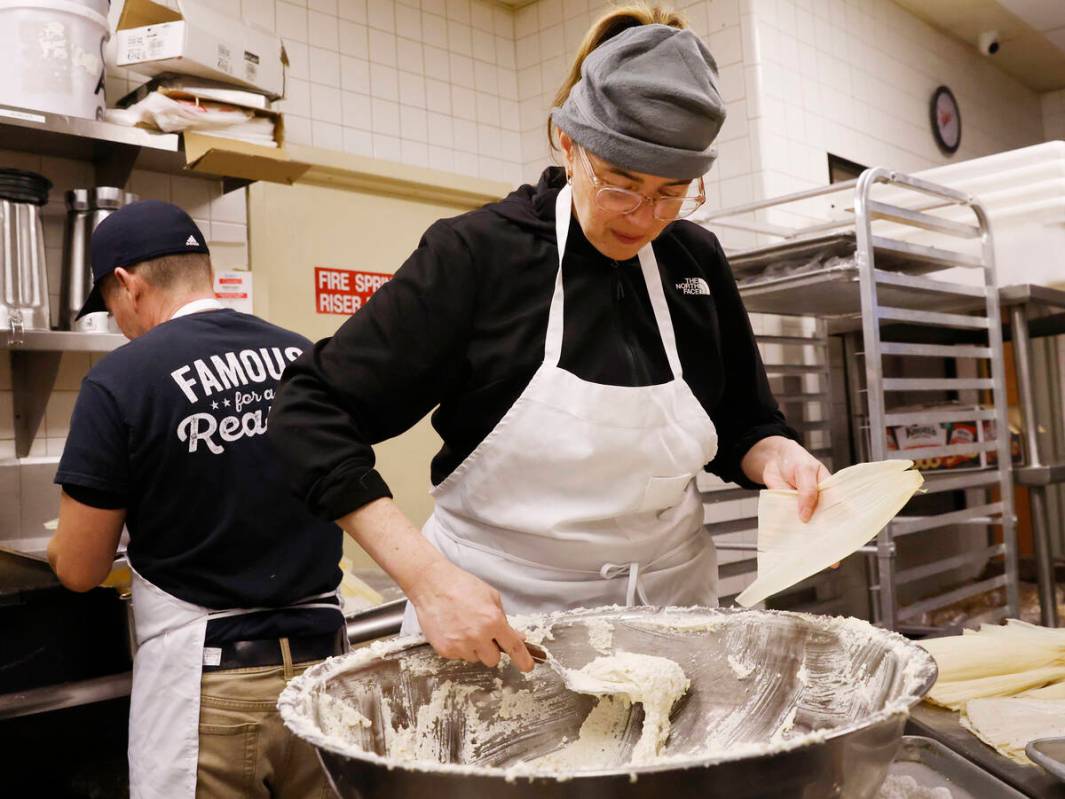 Neriza Martinez Johnson, owner of Doña Maria's Tamales, makes tamales at her restaurant on Thu ...