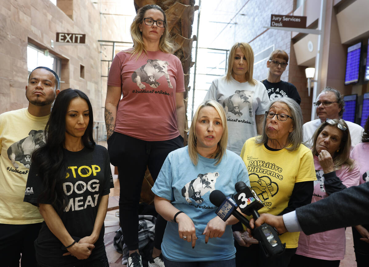 Lindsey Pinafel, a volunteer at Vegas Pet Rescue Project, speaks outside a courtroom where Mark ...