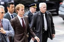 Daniel Penny, center, arrives at criminal court, Monday, Dec. 9, 2024, in New York. (AP Photo/S ...