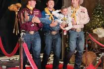 Steer wrestlers Hunter Koch, Rowdy Parrott and Tyler Waguespack walk their Golden Circle of Cha ...