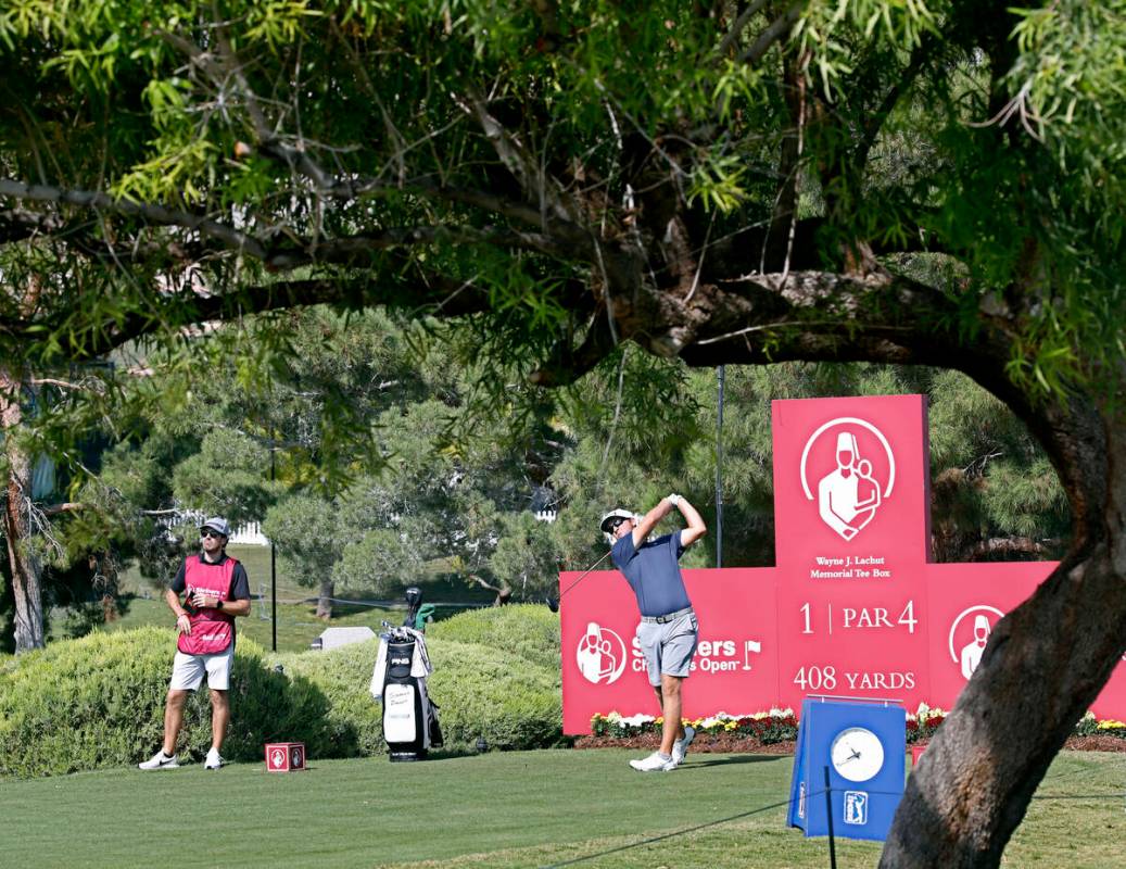 Seamus Power watches his tee shot at the first hole during the Shriners ChildrenÕs Open golf P ...