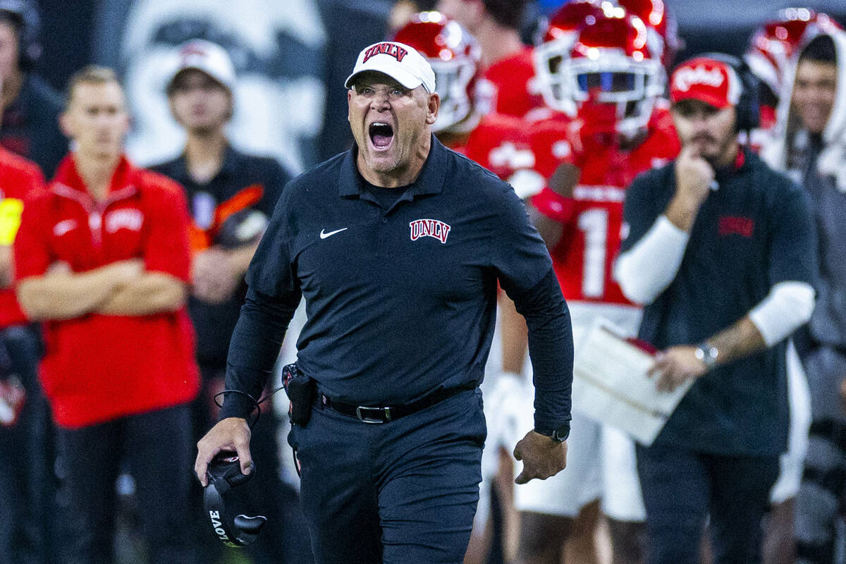 UNLV head coach Barry Odom emphasizes his point to a referee against the Boise State Broncos du ...