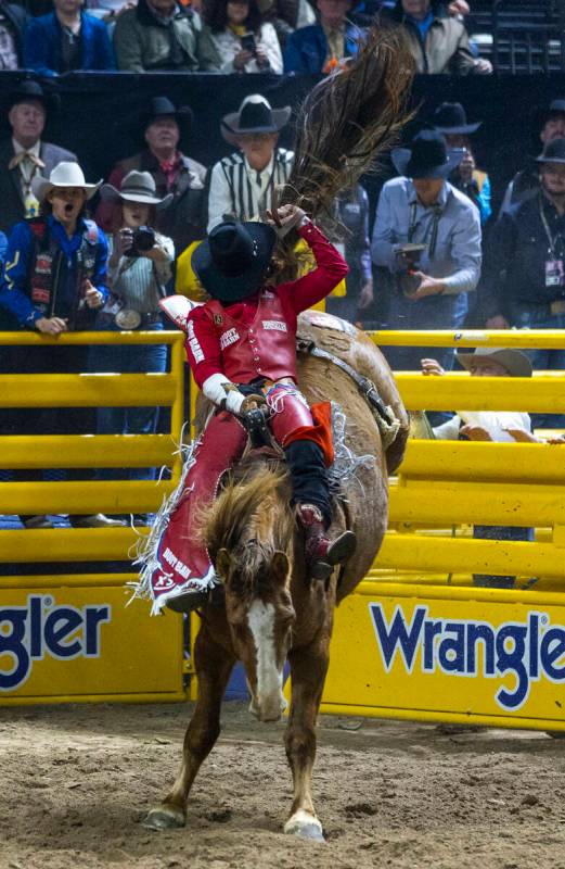 Bare Back Riding contestant Rocker Steiner rides Tator Tot to a winning score during National F ...