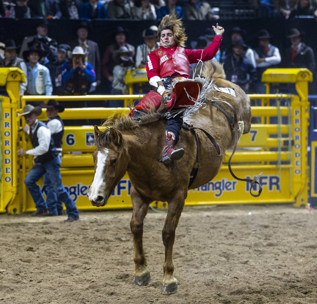 Bare Back Riding contestant Rocker Steiner rides Tator Tot to a winning score during National F ...