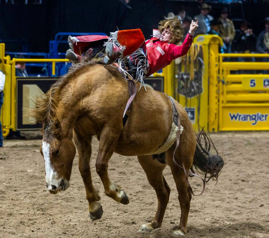 Bare Back Riding contestant Rocker Steiner rides Tator Tot to a winning score during National F ...