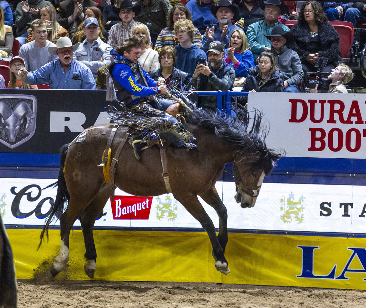 Saddle Bronc Riding contestant Statler Wright rides Jessica Rabbit to a winning score during Na ...