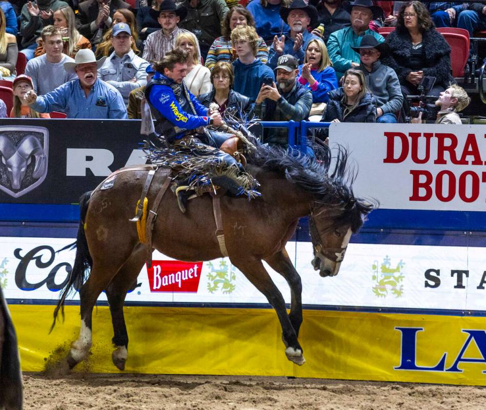 Saddle Bronc Riding contestant Statler Wright rides Jessica Rabbit to a winning score during Na ...