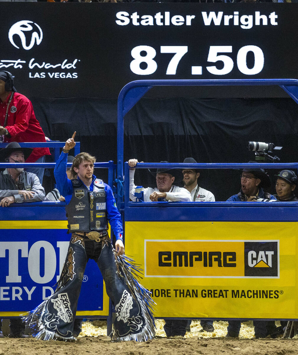 Saddle Bronc Riding contestant Statler Wright celebrates after riding Jessica Rabbit to a winni ...