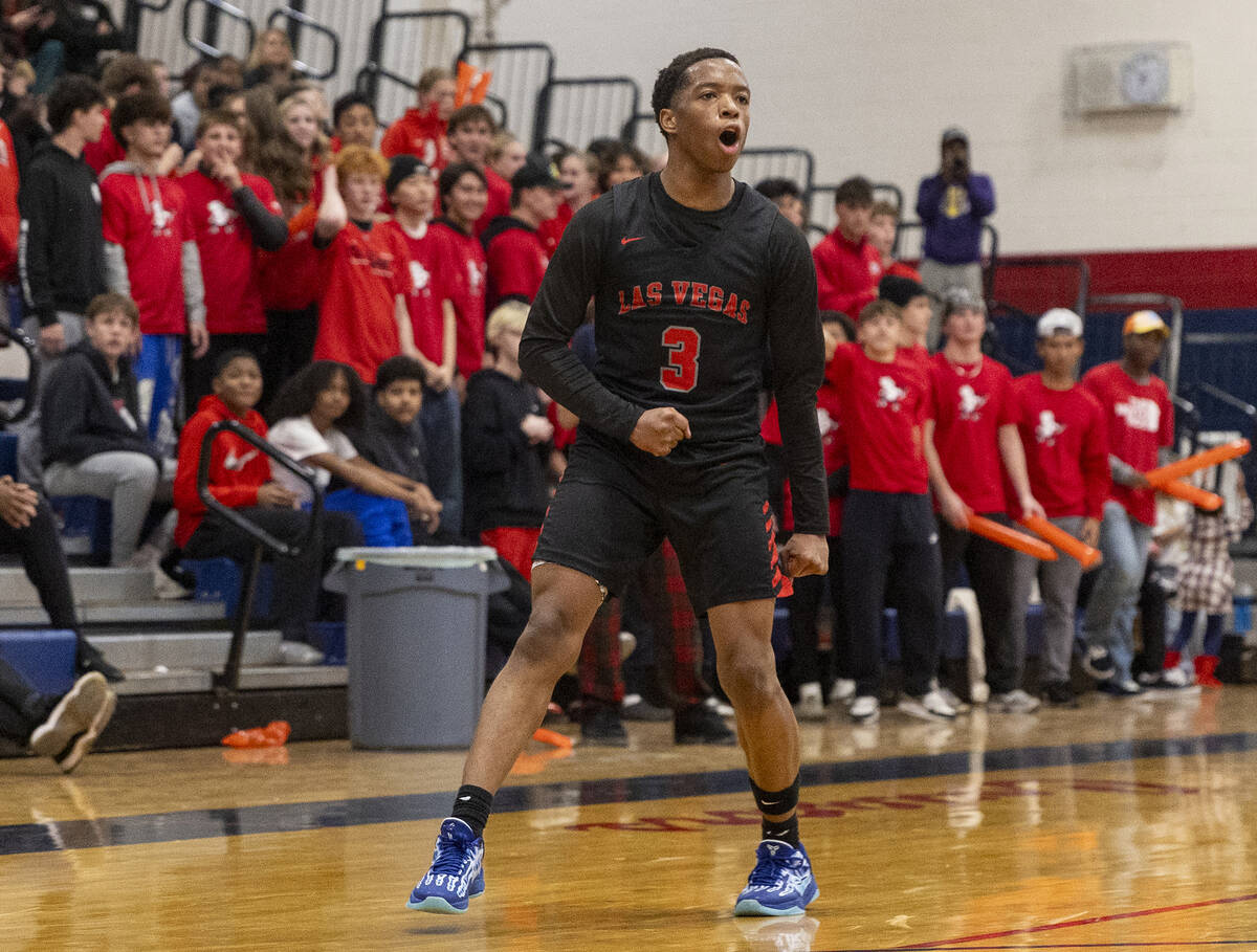 Las Vegas senior Tayshaun Jackson (3) celebrates a play during the high school basketball game ...