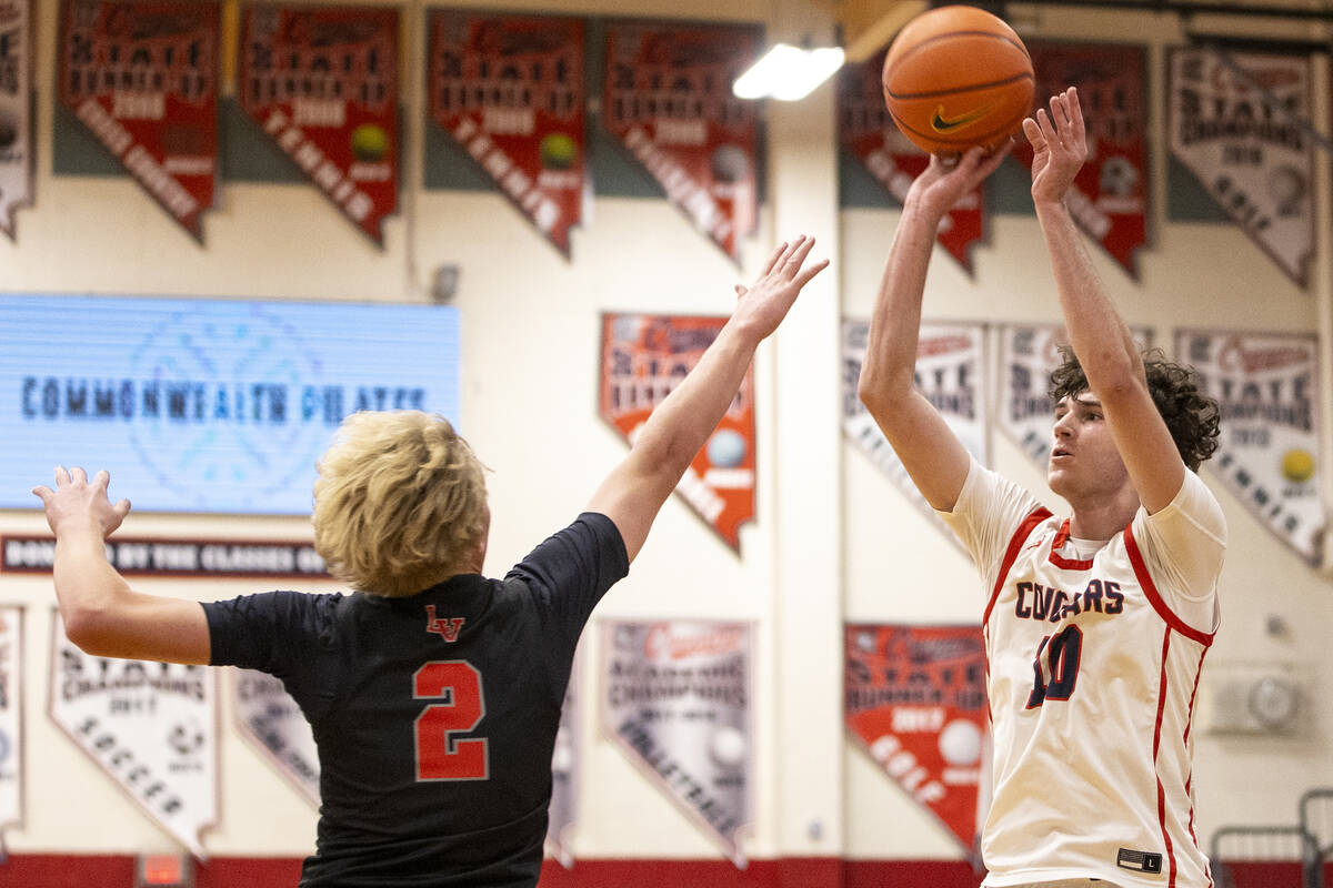 Coronado senior Mason Abittan (10) attempts a shot during the high school basketball game again ...