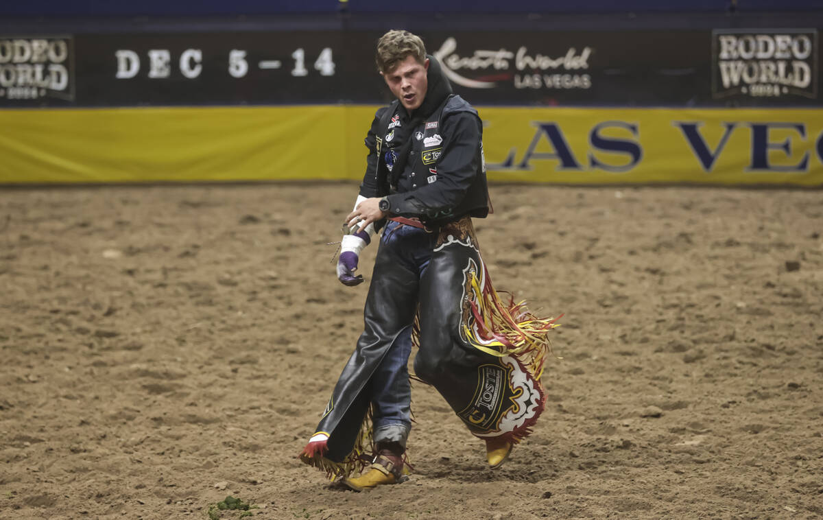 Jacob Lees reacts after competing in bareback riding during the fifth go-round of the National ...