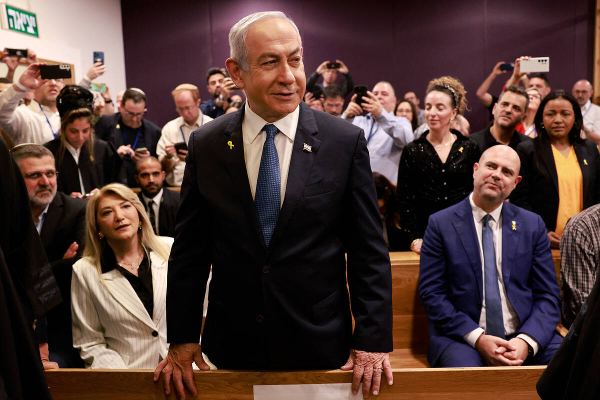 Israeli Prime Minister Benjamin Netanyahu attends a hearing in his trial on corruption charges ...