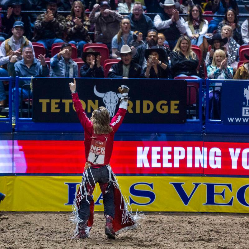 Bareback riding contestant Rocker Steiner celebrates after riding Tator Tot to a winning score ...