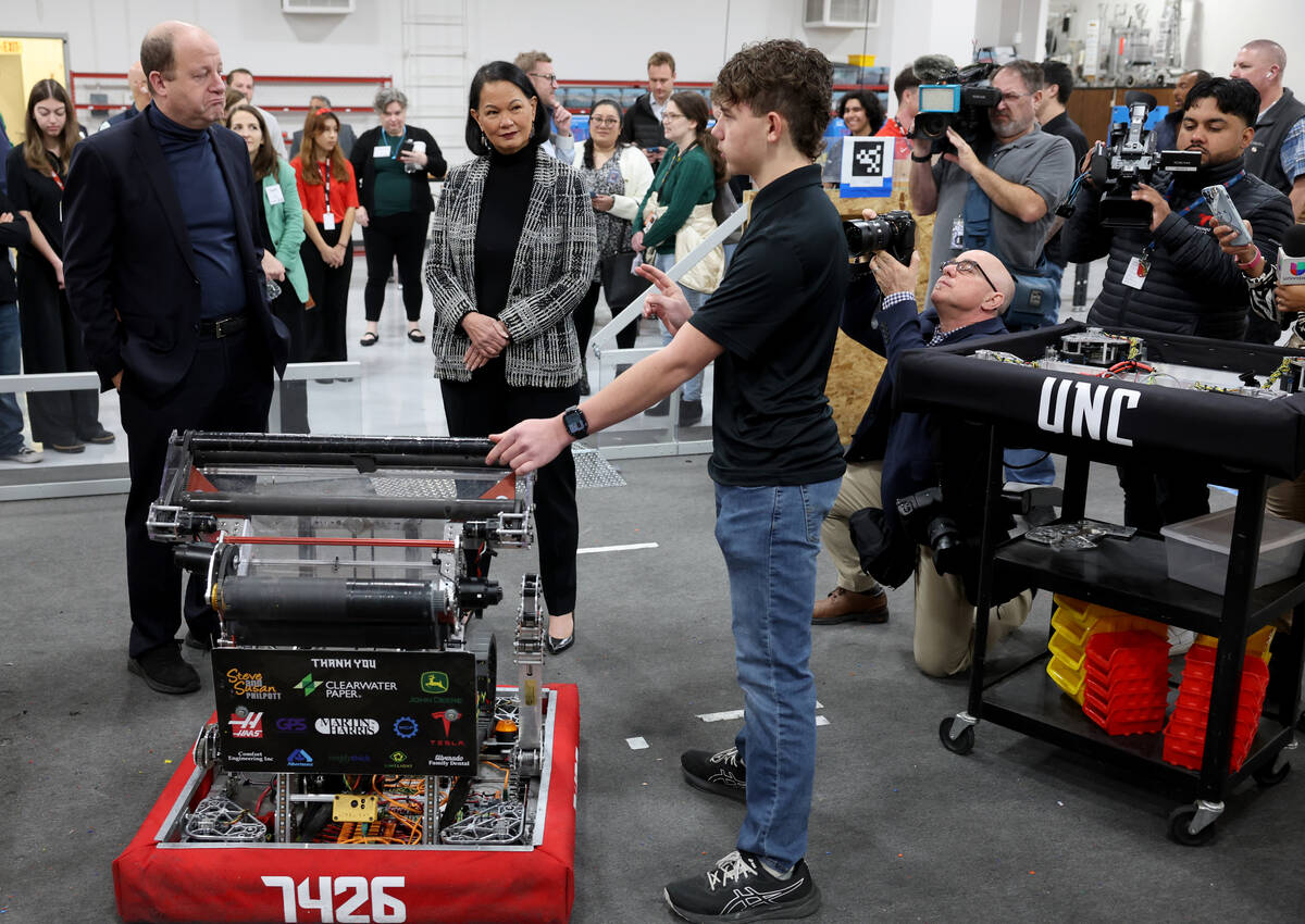 Southeast Career Technical Academy Advanced Manufacturing major Tanner Janik, 14, gives a tour ...