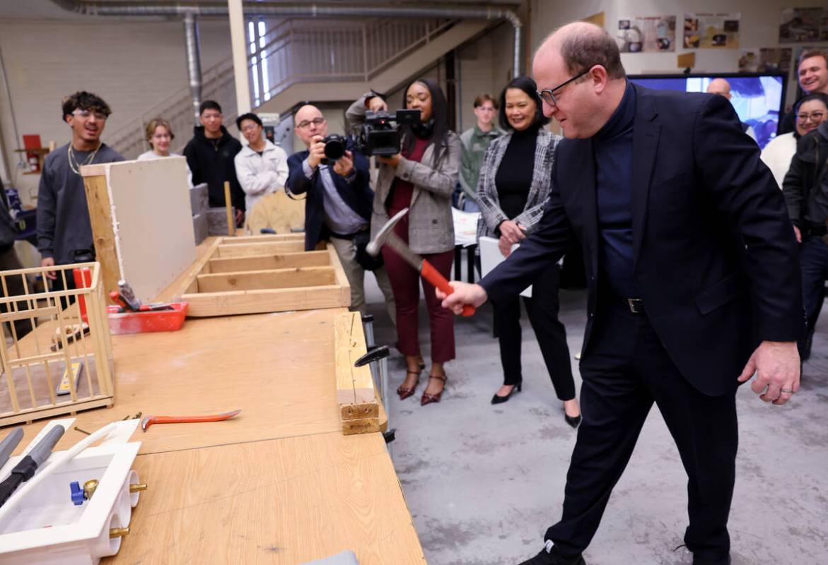 Colorado Gov. Jared Polis checks out the construction lab during a tour Southeast Career Techni ...