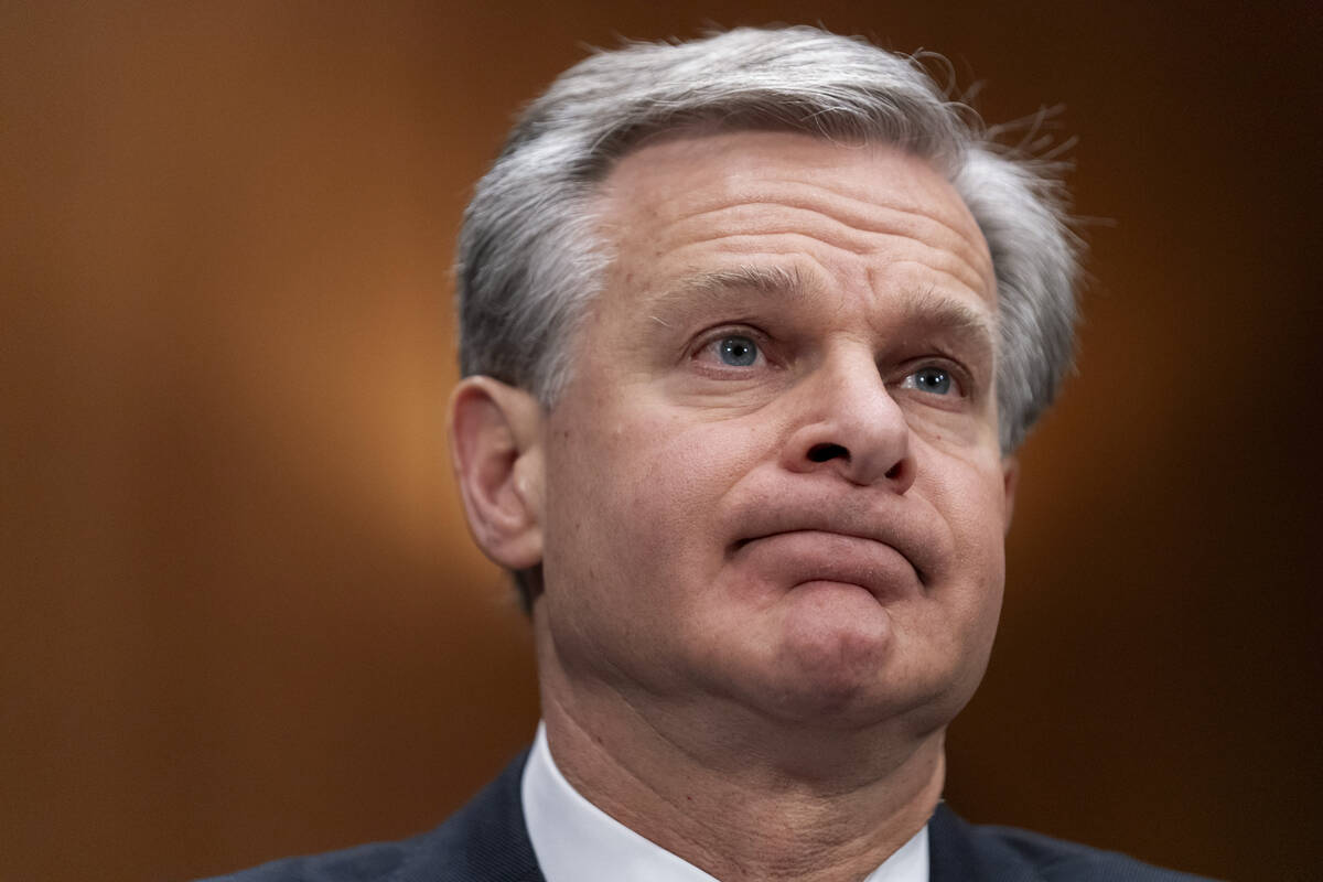 FBI Director Christopher Wray testifies during a Senate Homeland Security and Governmental Affa ...