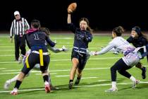 Shadow Ridge junior Mariah Stevens-Walden (15) avoids Liberty defenders during the high school ...