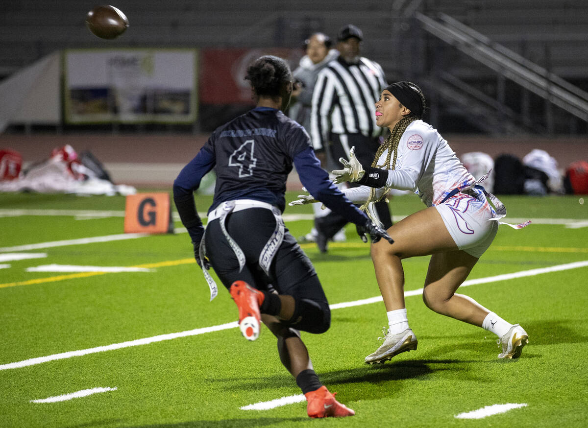 Liberty senior Kilolo Westerlund (4) looks to catch a pass during the high school flag football ...