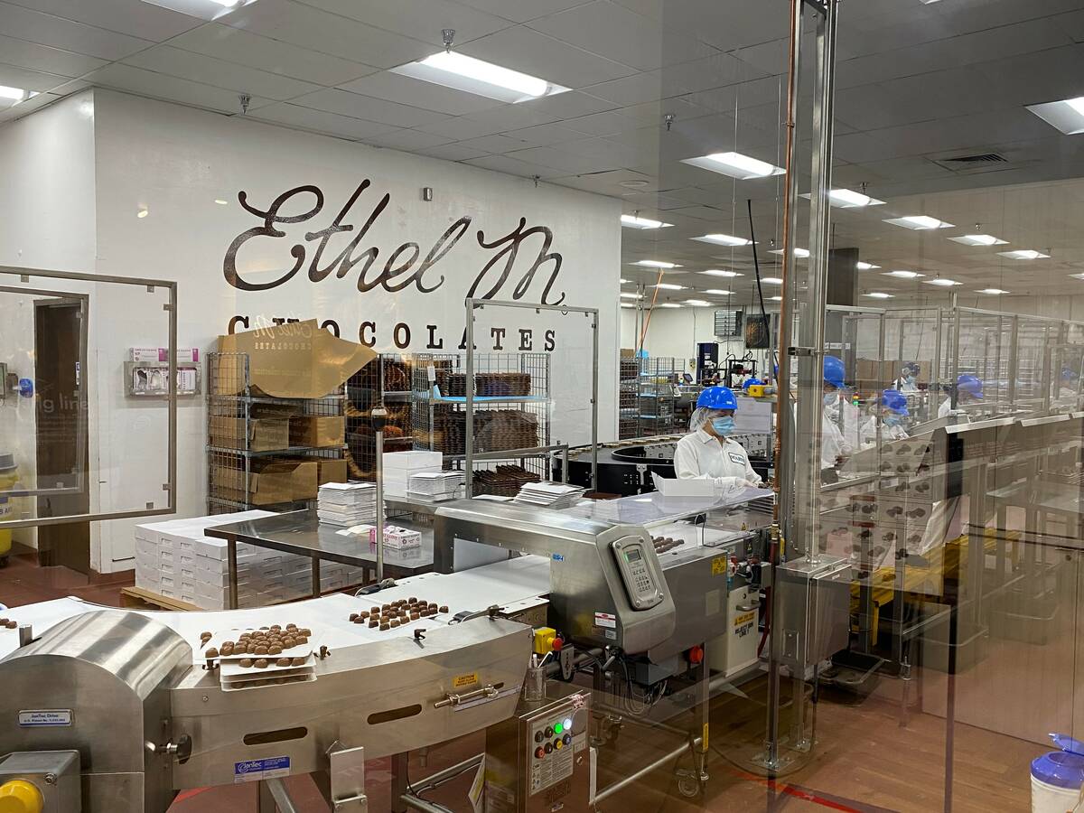 Ethel M Chocolates associates assemble chocolates in the factory. (Ethel M Chocolates)