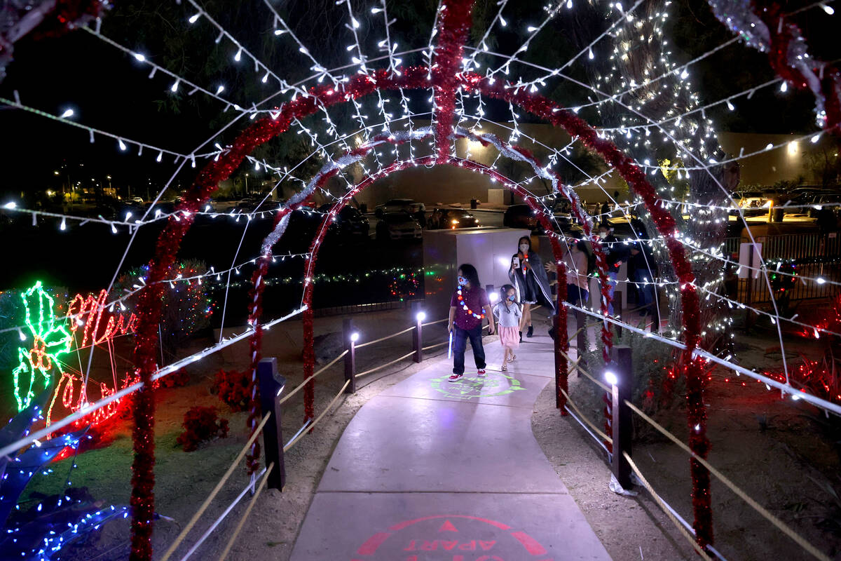 Maddox Macabenta, 7, and his sister Mila, 5, during the Ethel M Chocolates 27th Annual Holiday ...