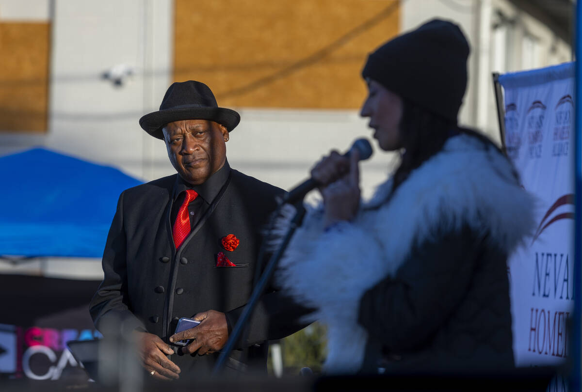 Straight From the Streets founder Thomas Randle El listens in as Meredith Spriggs speaks during ...