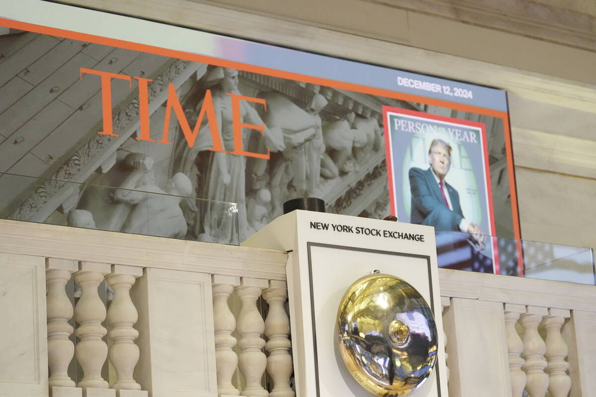 A cover of Time magazine's person of the year, shows President-elect Donald Trump, before he ar ...