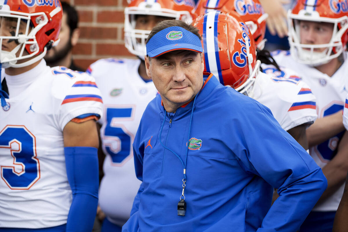 Florida head coach Dan Mullen prepares to lead his team on the field prior to the start of an N ...