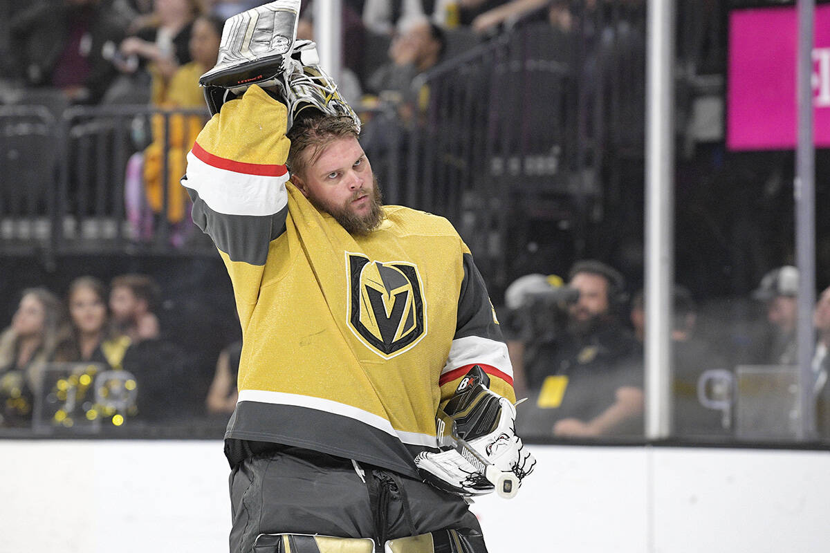 Vegas Golden Knights goaltender Robin Lehner puts his helmet on before the team's NHL game agai ...