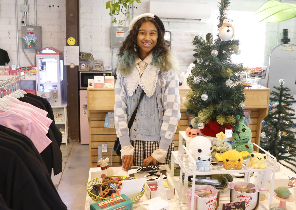 Kumei Norwood, 16, an entrepreneur and owner of Tofu Tees, an apparel and gift shop in Ferguson ...