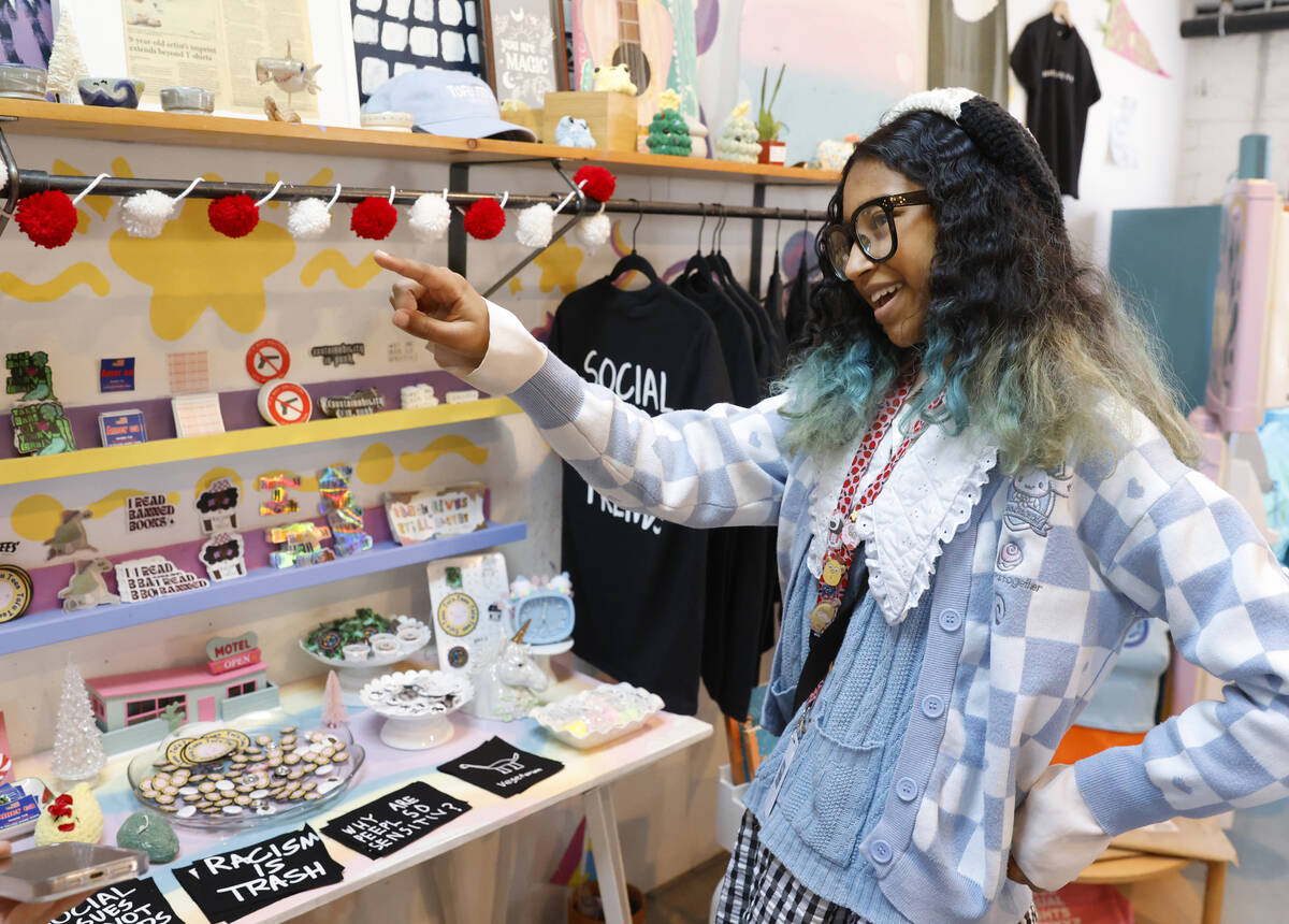 Kumei Norwood, 16, an entrepreneur and owner of Tofu Tees, an apparel and gift shop in Ferguson ...