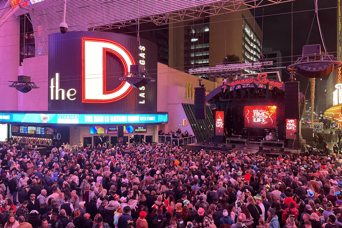 A large crowd is gathered at the Third Street Stage at the Fremont Street Experience on Dec. 31 ...