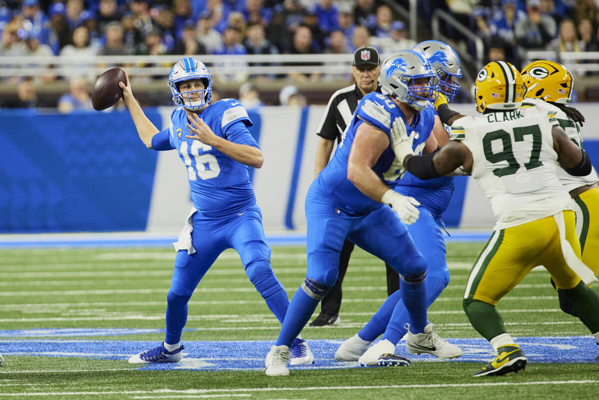 Detroit Lions quarterback Jared Goff (16) passes against the Green Bay Packer during an NFL foo ...