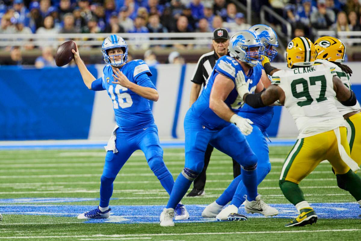 Detroit Lions quarterback Jared Goff (16) passes against the Green Bay Packer during an NFL foo ...