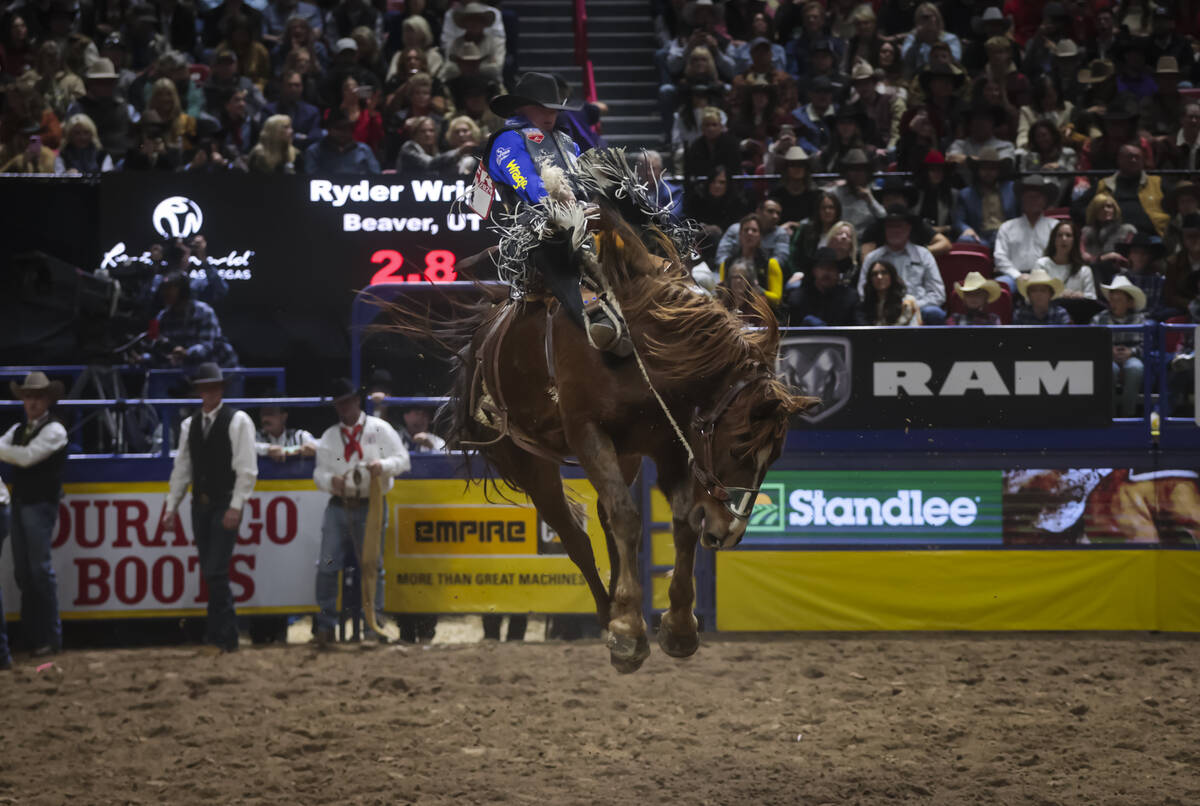 Ryder Wright competes in saddle bronc riding during the 8th go-round of the National Finals Rod ...