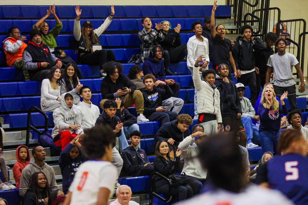 Liberty fans cheer for their team during a basketball game between Liberty and Bishop Gorman at ...