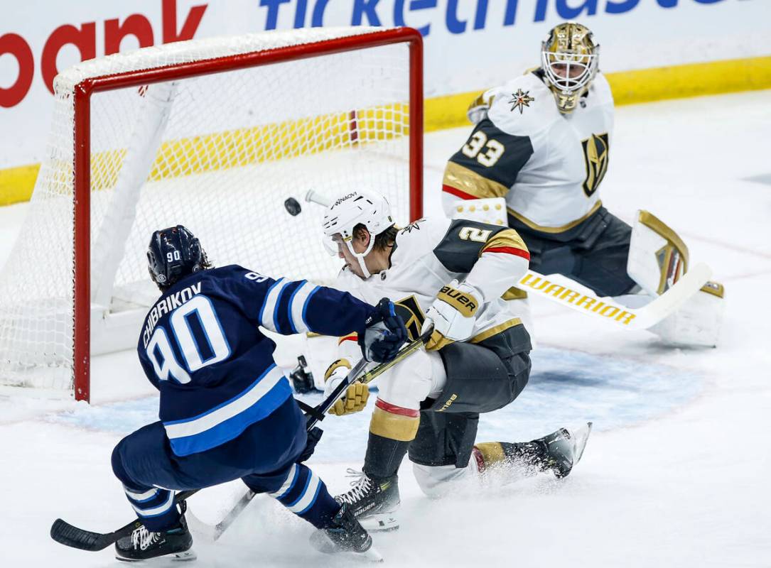 Vegas Golden Knights' Shea Theodore (27), Mark Stone (61), Victor Olofsson (95) and Tomas Hertl ...