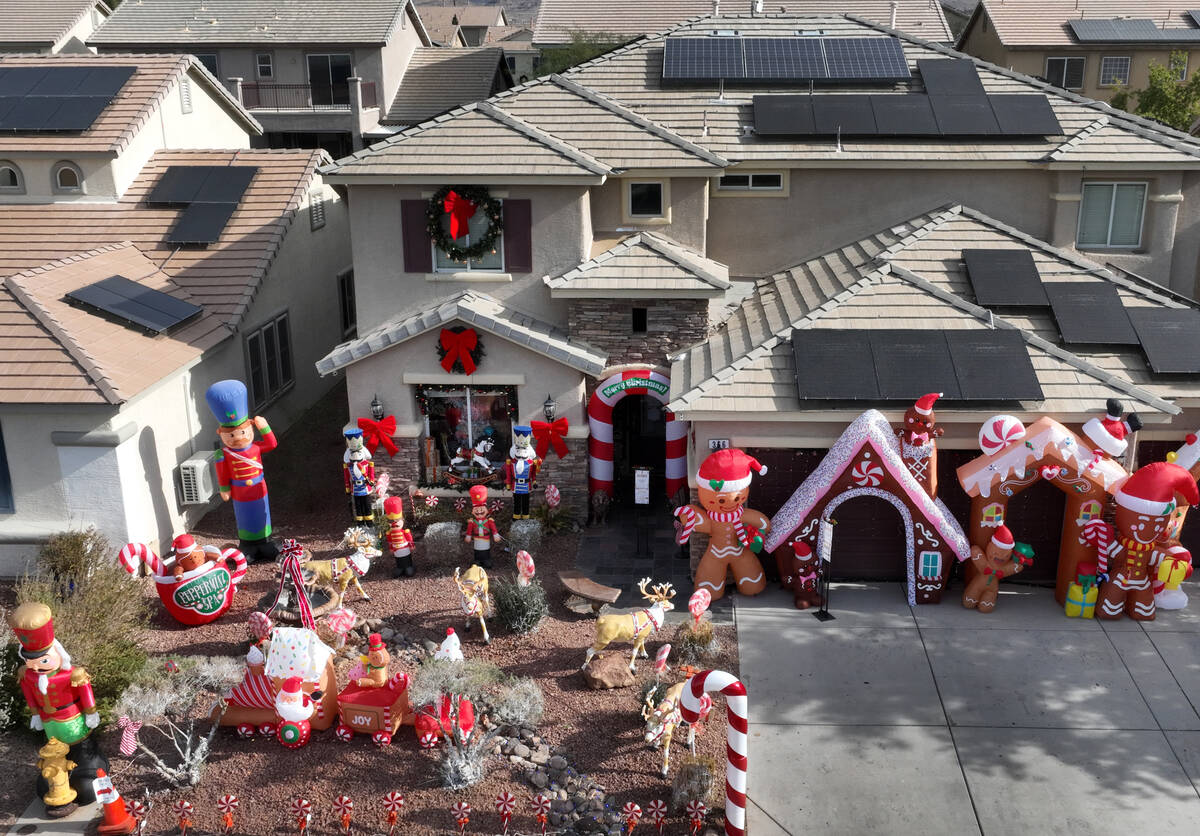 The extravagant Christmas decorating is seen outside Joey Cardona and husband Victor Cardenas' ...