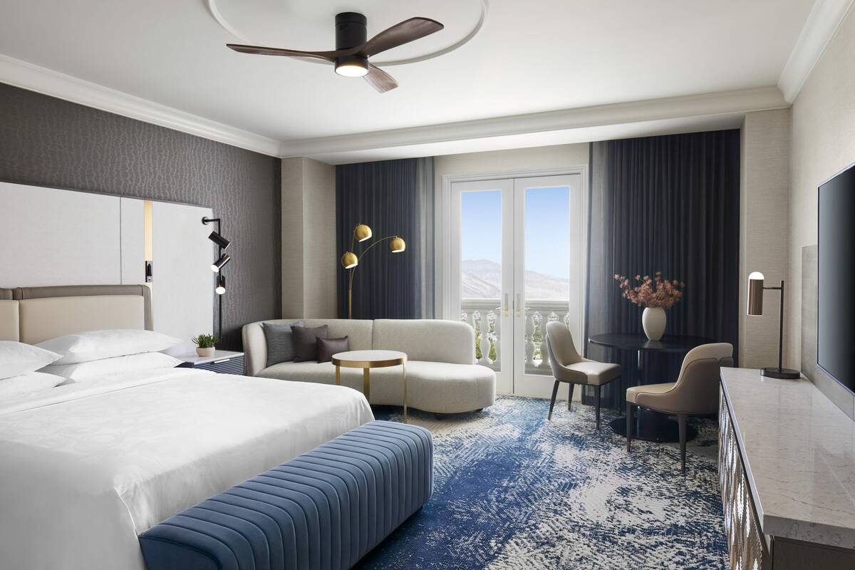 A deluxe king guest room at the JW Marriott in Summerlin. The hotel and Rampart casino recently ...