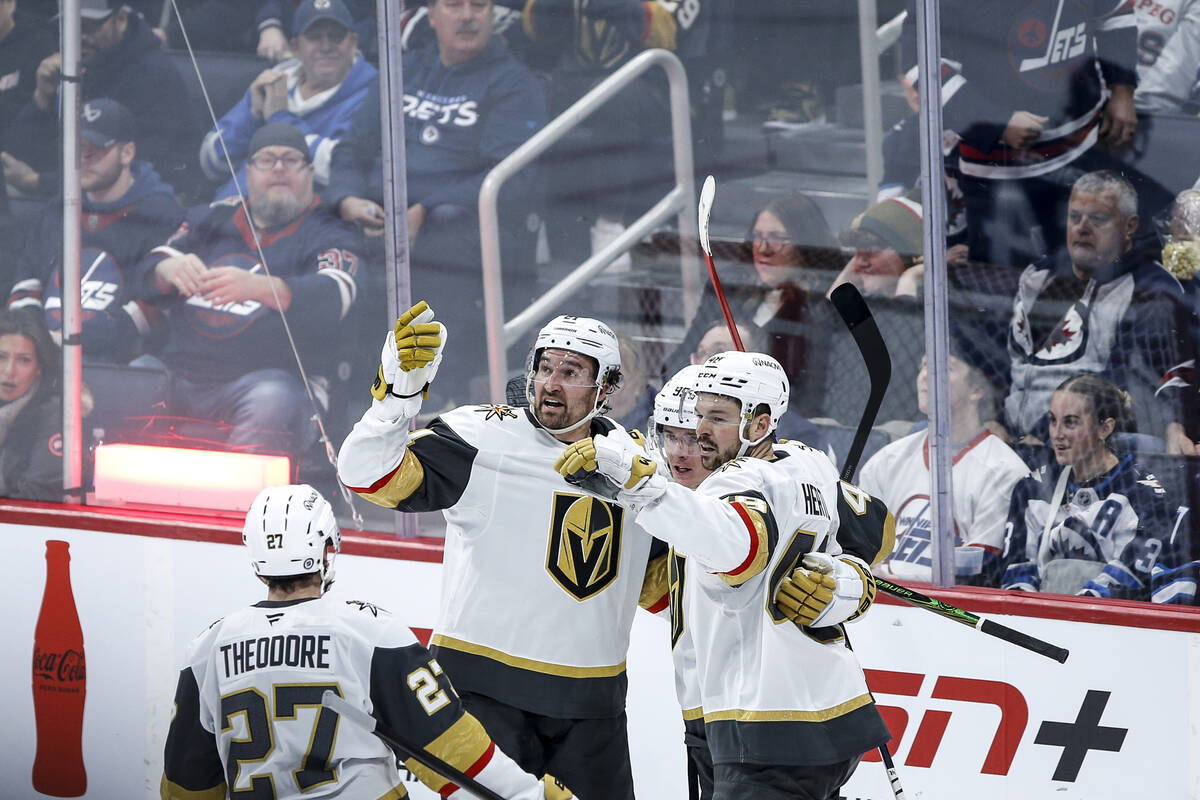 Vegas Golden Knights' Shea Theodore (27), Mark Stone (61), Victor Olofsson (95) and Tomas Hertl ...